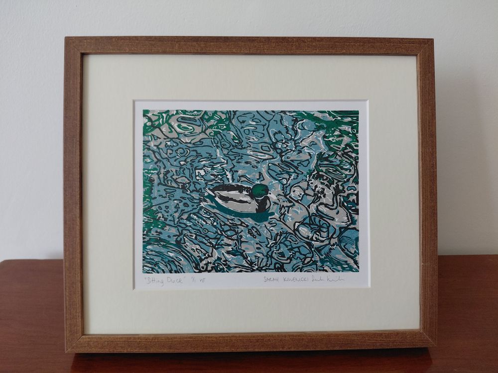 Brown wood frame, ivory mount