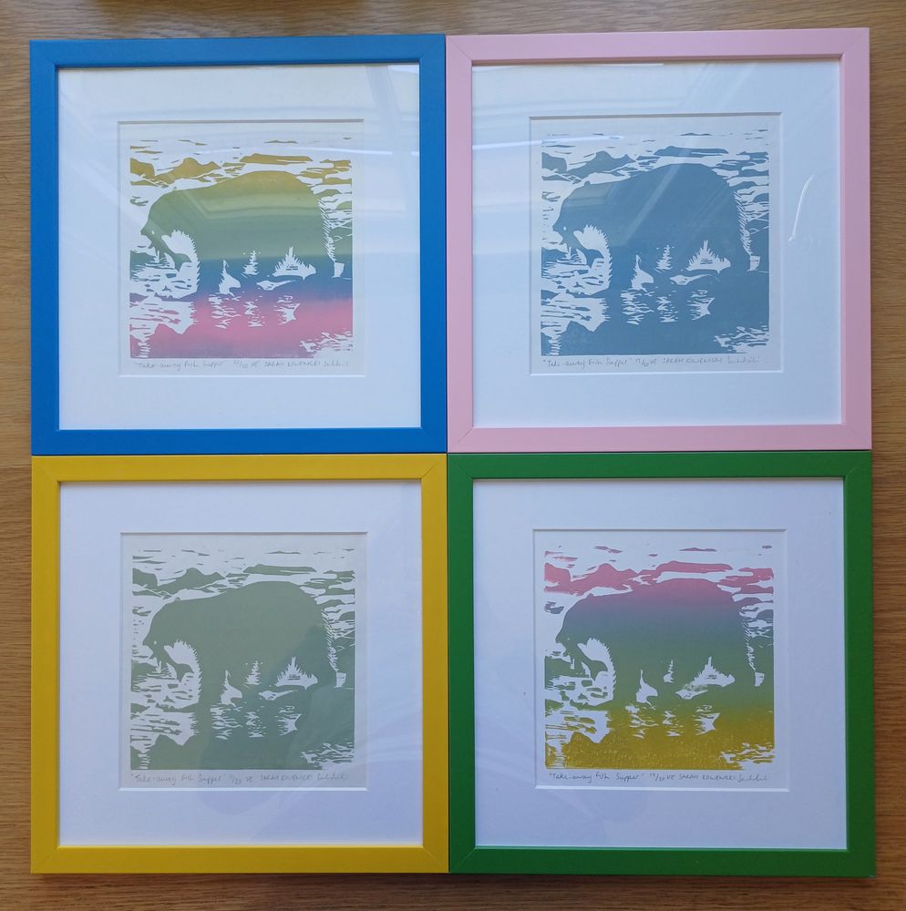 A selection of prints, framed